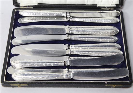 Eleven George V silver handled dessert knives.